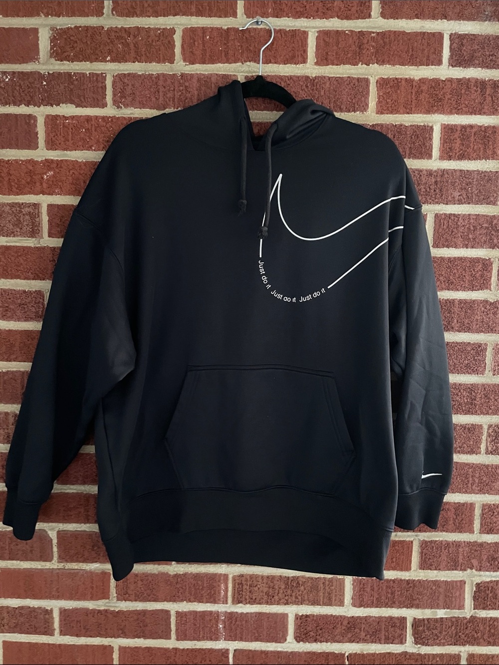 Nike Black Hoodie with White Swoosh Graphic